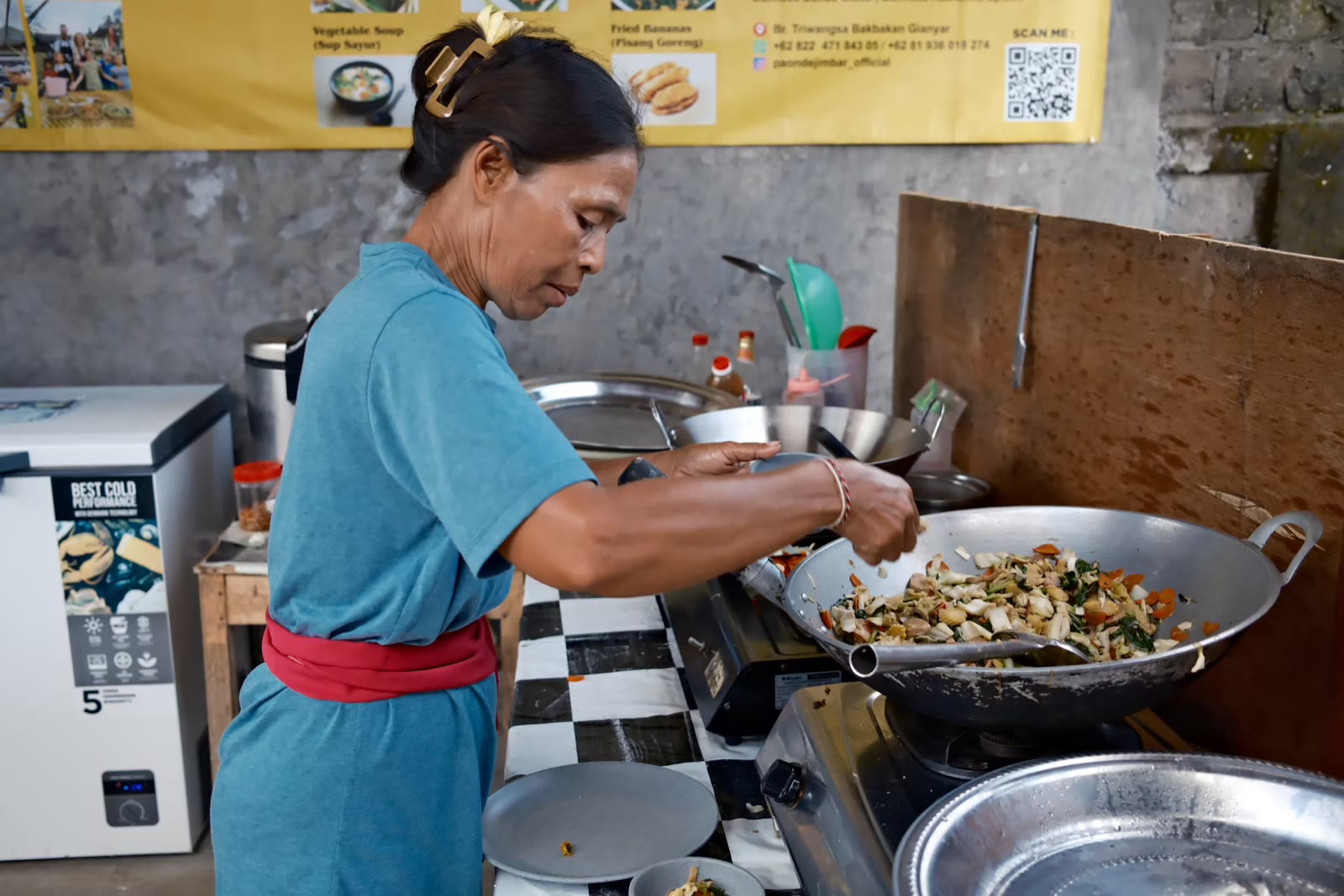 A local cook preparing the community meal